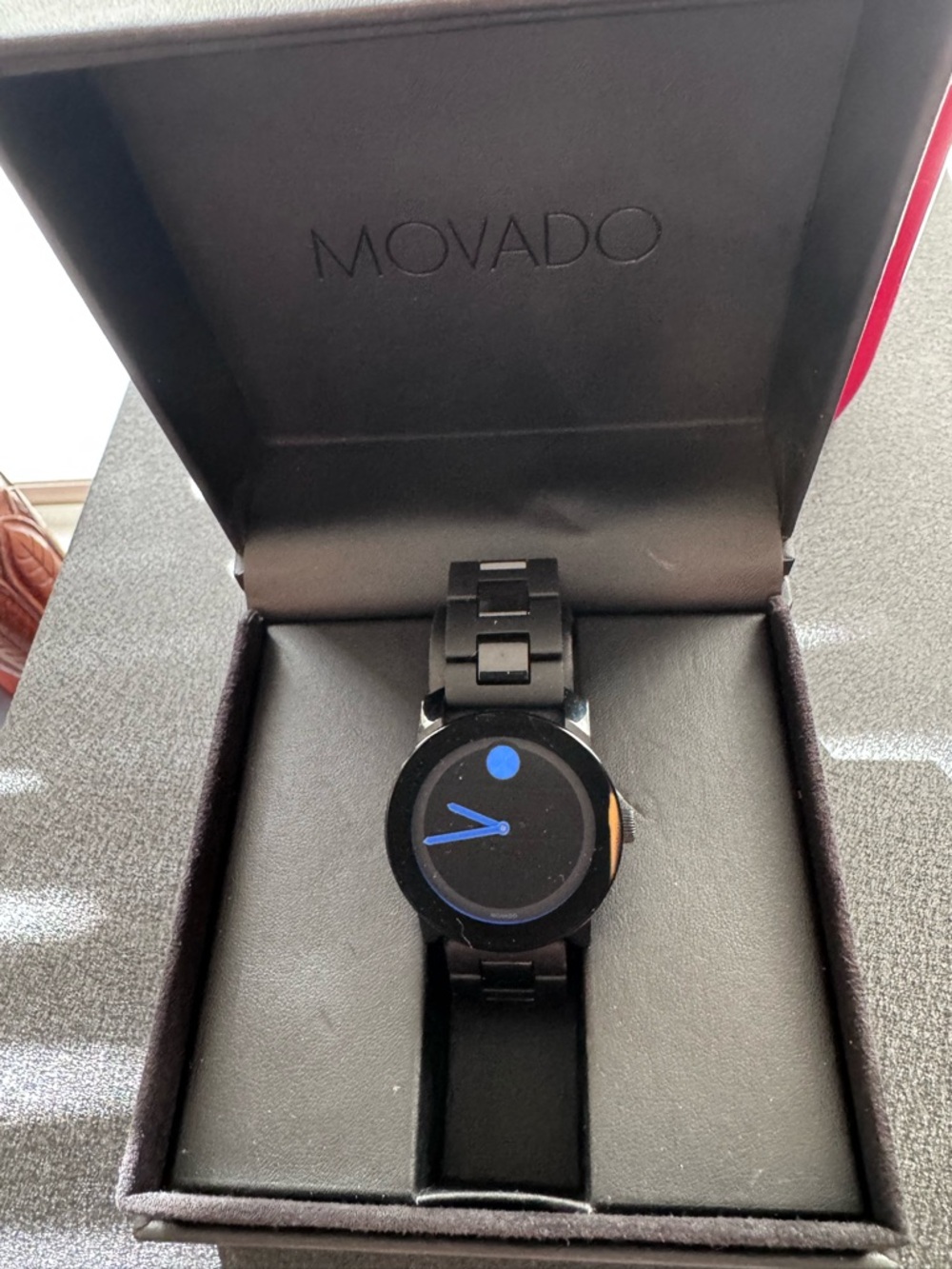 Movado Black Watch with Blue Accents